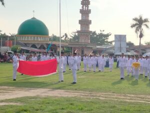 HUT Proklamasi Kemerdekaan RI Ke-79. Polsek Labuhan Ruku Upacara Penurunan Bendera Merah Putih.