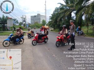 Satlantas Polres Batu Bara Atur Lalin di Persimpangan