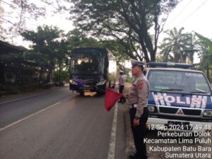 Patroli Kibas Bendera Program Kapolri Menempatkan Pergelaran Anggota Sat Lantas di Titik Rawan.