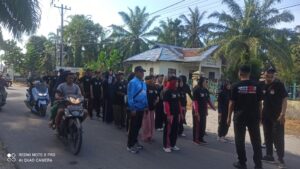 Gerak Jalan Sehat Menuju Pilkada Serentak Bersama PPK Nibung Hangus, Tingkatkan Partisipasi Pemilih.