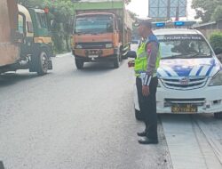 Satlantas Polres Batu Bara Patroli Kibas Bendera di Rawan Kecelakaan Dan Kemacetan.