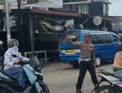 Sat Lantas Polres Batu Bara Rutin Pengaturan Lalu Lintas di Persimpangan Jalinsum.